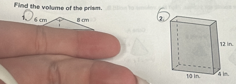 Find the volume of the prism.
6 cm 8 cm
2. 
.