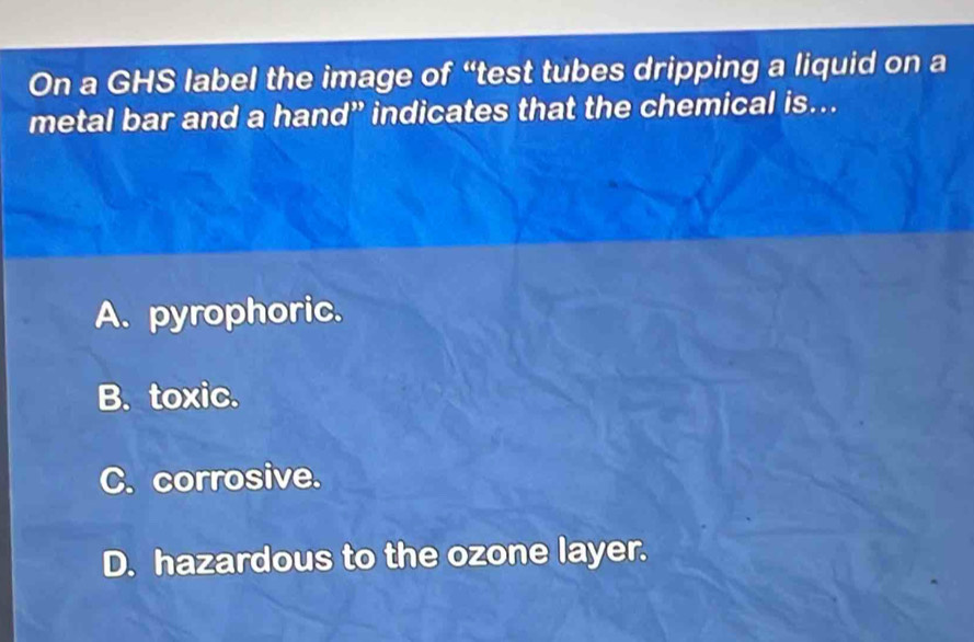 Solved: On a GHS label the image of “test tubes dripping a liquid on a ...