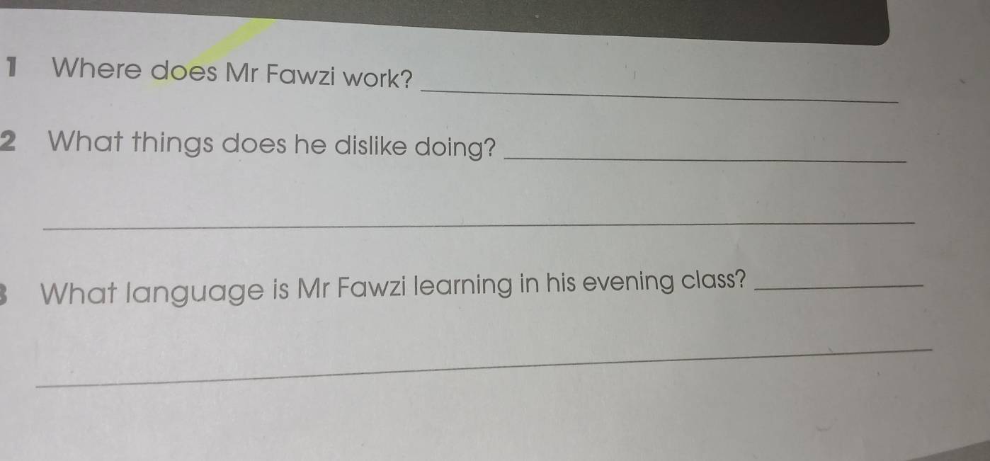 Where does Mr Fawzi work? 
2 What things does he dislike doing?_ 
_ 
What language is Mr Fawzi learning in his evening class?_ 
_