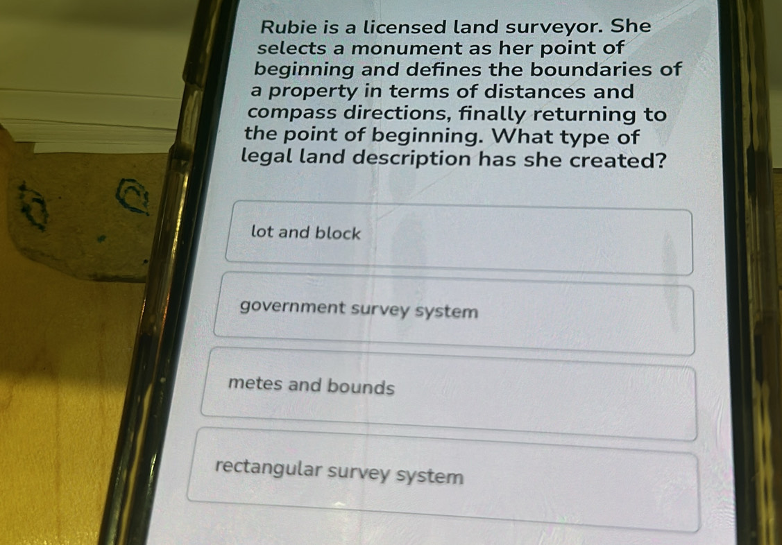 Solved: Rubie is a licensed land surveyor. She selects a monument as ...