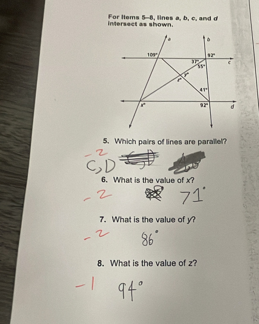 For Items 5-8, lines a, b, c, and d
intersect as shown.
5. Which pairs of lines are parallel?
6. What is the value of x?
7. What is the value of y?
8. What is the value of z?