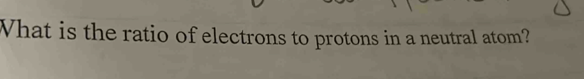 What is the ratio of electrons to protons in a neutral atom?