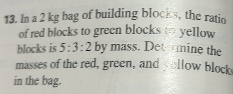 Solved: In a 2 kg bag of building blocks, the ratio of red blocks to ...