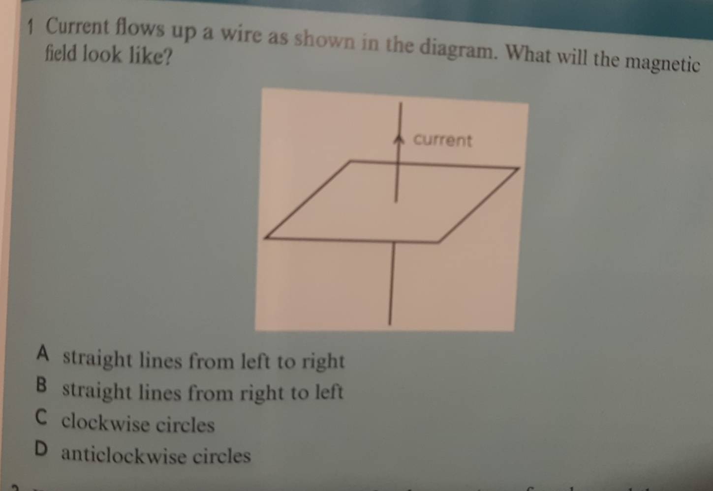 Solved: Current flows up a wire as shown in the diagram. What will the ...