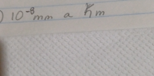 10^(-8)mm a Km