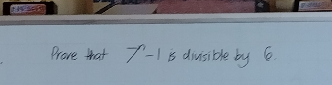 Prove that 7^(-n)-1 is divisible by 6.