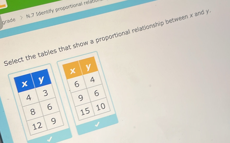 Solved: grade N.7 Identify proportional relation ect the tables at show ...