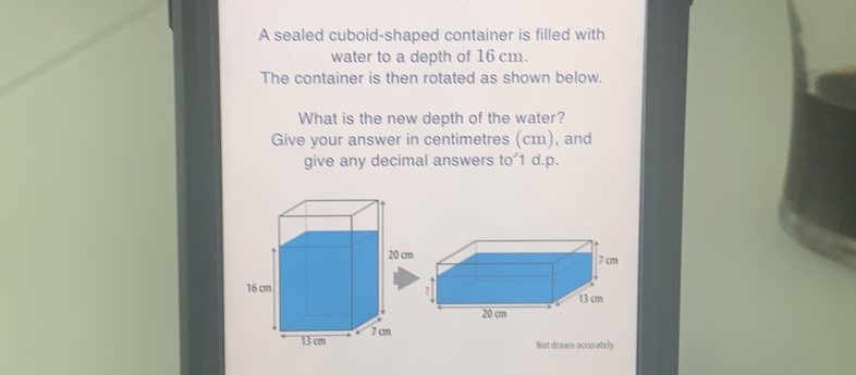 Solved: A sealed cuboid-shaped container is filled with water to a ...