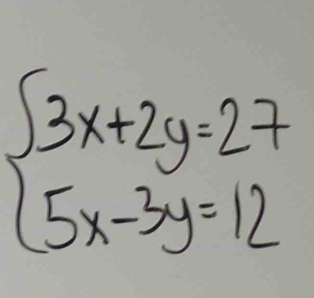 beginarrayl 3x+2y=27 5x-3y=12endarray.