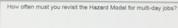 How often must you revisit the Hazard Model for multi-day jobs?