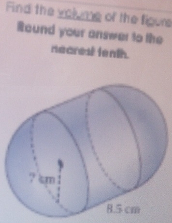 Find the volume of the figure 
Round your answer to the 
necrest tenth.