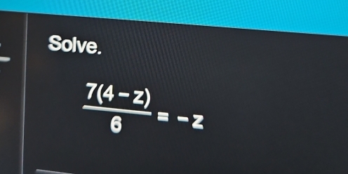 Solve.
 (7(4-2))/6 =-2