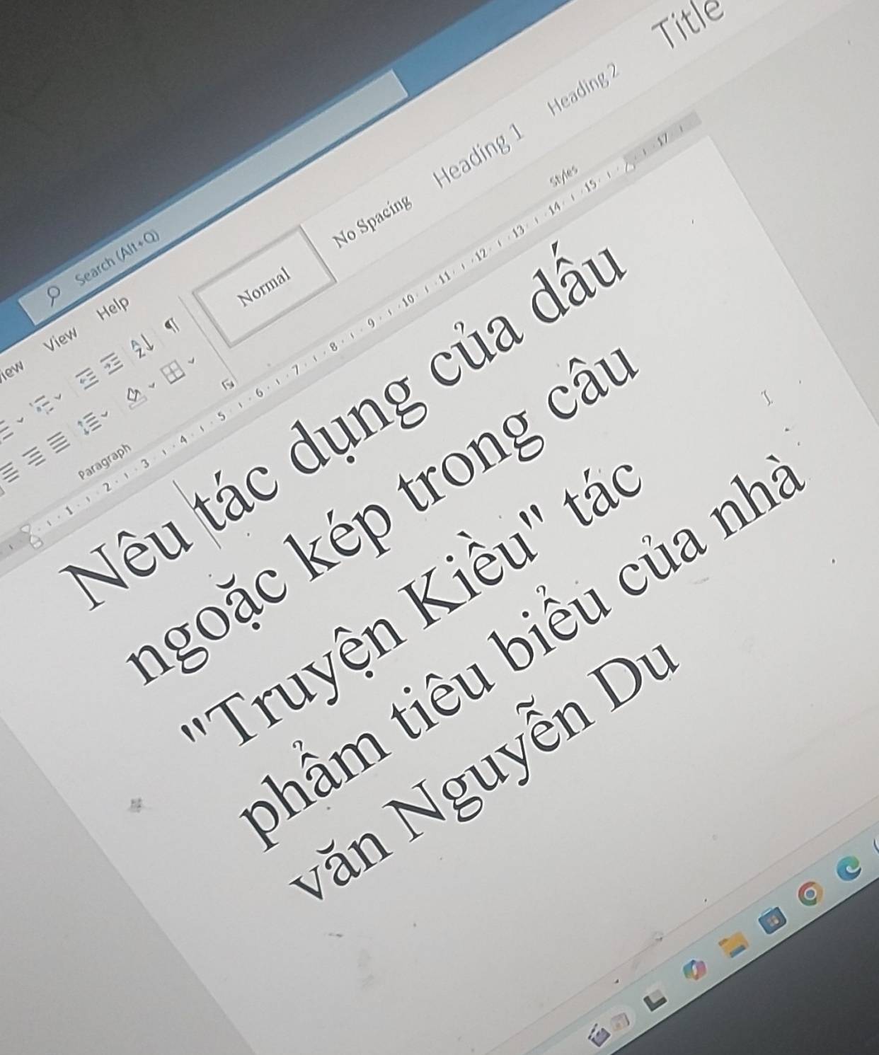 Title 
Spacing Heading 1 Headin 
styles 
Search (Alt+Q) 
Normal 
ew View Hel 
2 
Nêu tác dụng của dấ 
Paragraph 
goặc kép trong câ 
Truyện Kiều" tá 
thầm tiêu biểu của nh 
Văn Nguyễn Dy