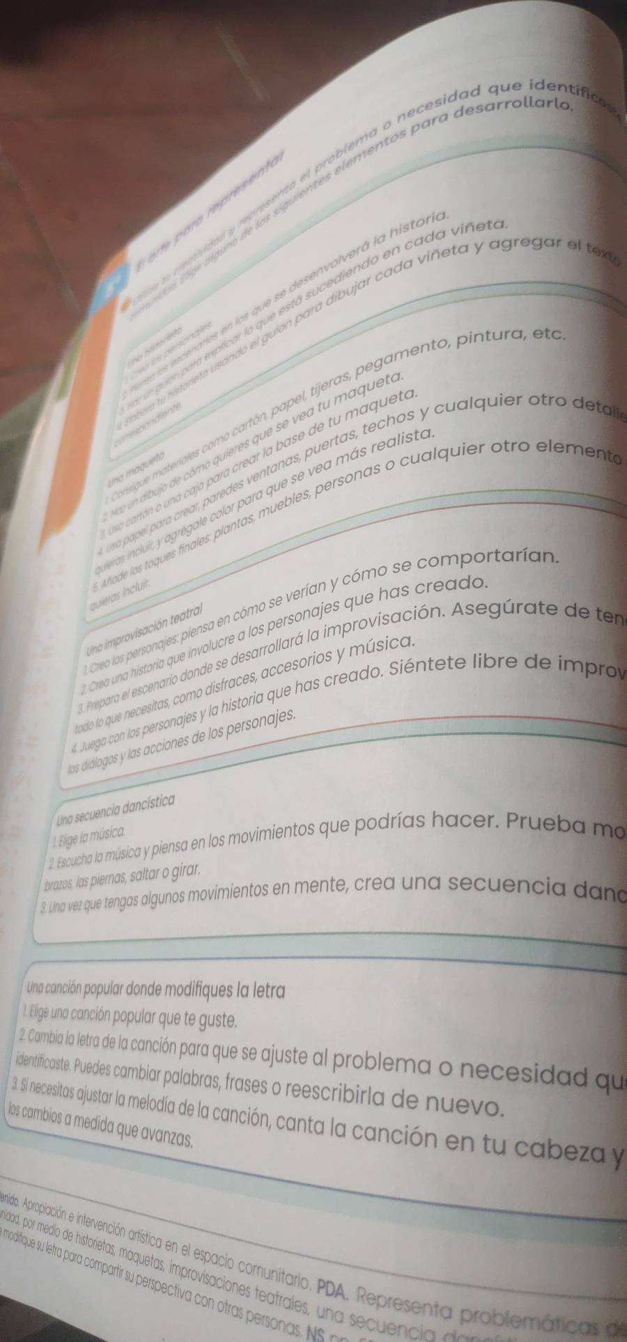 ie toe creathided y representa el problema o necesidad que identifia
aa  as a g no de los siguientes elementos para desarrollas
ara   re  rese
a os  scenarios en los que se desenvolverá la histo.
d n guló para exxplicar lo que está sucediendo en cada viñe.
abora tu histoneto usando el guion para dibujar cada viñeta y agregar el te
us Hstorásh
== es deróran
onsigue materiales como cartón, papel, tijeras, pegamento, pintura, el
c n  s p o diente
az un dibujo de cômo quieres que se vea tu maquet
ssa cartón o una caja para crear la base de tu maquet
na magueto
Usa papel para crear, paredes ventanas, puertas, techos y cualquier otro deta
eras incluir, y agrégale color para que se vea más realiste
quieras incluír. whade los toques finales: plantas, muebles, personas o cualquier otro element
Crea los personajes: piensa en cómo se verían y cómo se comportarían
Uno improvisación teatral
Crea una historia que involucre a los personajes que has creado
3. Prepara el escenario donde se desarrollará la improvisación. Asegúrate de ter
todo lo que necesitas, como disfraces, accesorios y música
4. Juega con los personajes y la historia que has creado. Siéntete libre de impro
los diálogos y las acciones de los personajes
Una secuencia dancística
I. Elige la música.
2 Escucha la música y piensa en los movimientos que podrías hacer. Prueba ma
brazos, las piernas, saltar o girar.
3. Una vez que tengas algunos movimientos en mente, crea una secuencia dana
Una canción popular donde modifiques la letra
1. Elige una canción popular que te guste.
2. Cambia la letra de la canción para que se ajuste al problema o necesidad qu
identificaste. Puedes cambiar palabras, frases o reescribirla de nuevo.
3. Si necesitas ajustar la melodía de la canción, canta la canción en tu cabeza y
los cambios a medida que avanzas.
ido, Apropiación e intervención artística en el espacio comunitario. PDA. Representa problemáticas a
ditique su letra para compartir su perspectiva con otras persona e  dad, por medio de historietas, maquetas, improvisaciones featrales, una secuencia de