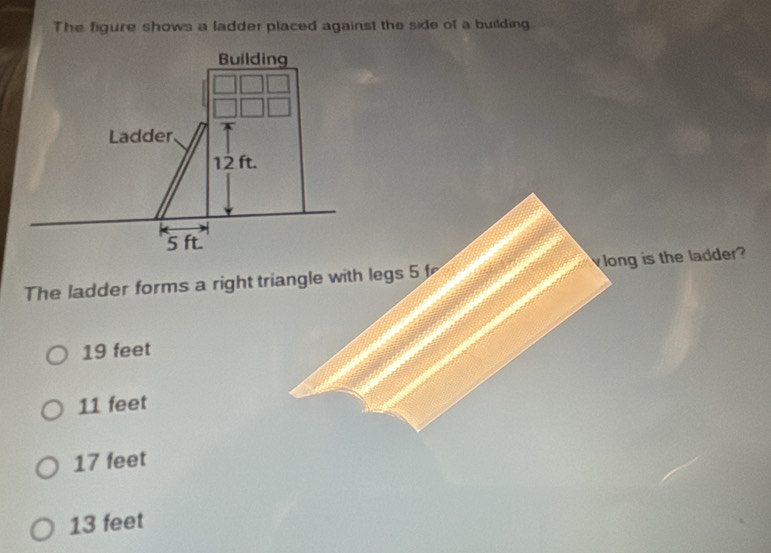 Solved: The figure shows a ladder placed against the side of a building ...