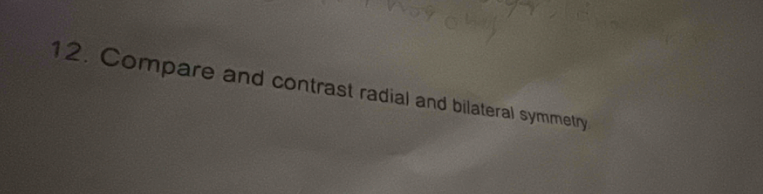 Compare and contrast radial and bilateral symmetry