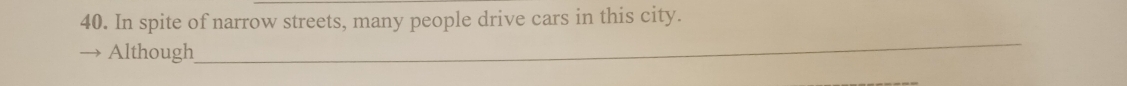 In spite of narrow streets, many people drive cars in this city. 
Although 
_