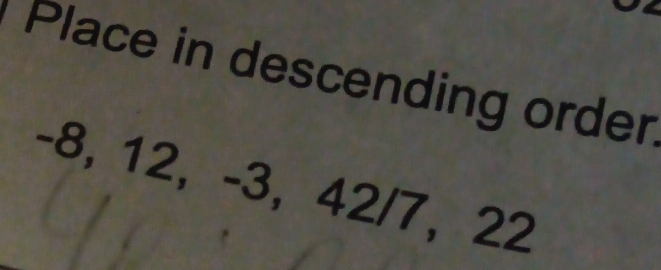 Place in descending order
-8, 12, -3, 42/7, 22