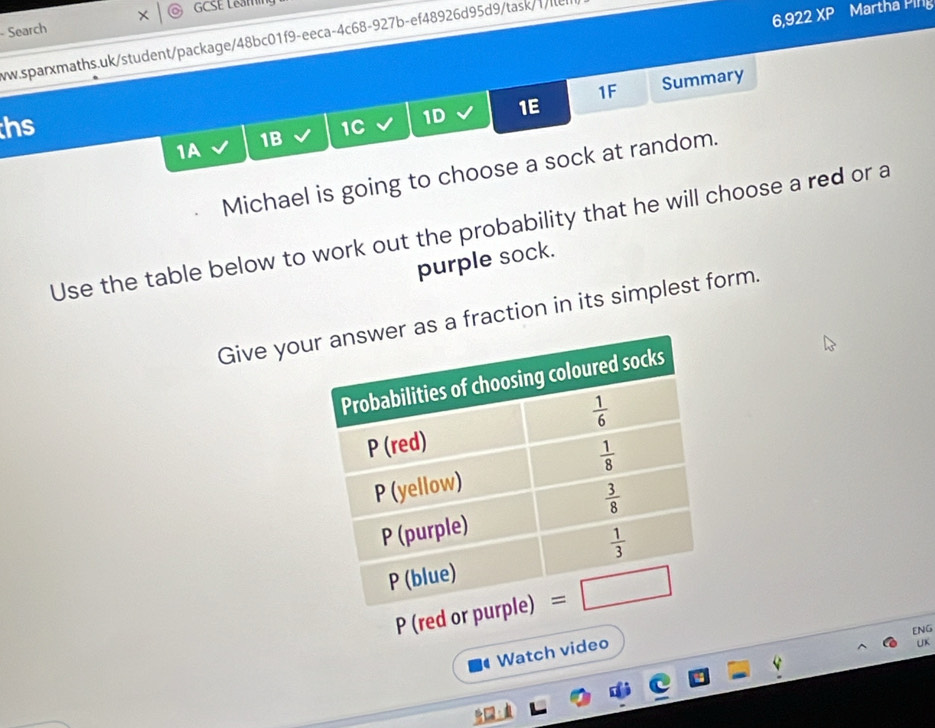 GCSE L&aming
Search
6,922 XP Martha Ping
ww.sparxmaths.uk/student/package/48bc01f9-eeca-4c68-927b-ef48926d95d9/task/1/lle
1F Summary
hs
1A 1B 1C 1D 1E
Michael is going to choose a sock at random.
Use the table below to work out the probability that he will choose a red or a
purple sock.
Give you fraction in its simplest form.
P (red
ENG
Watch video
UK