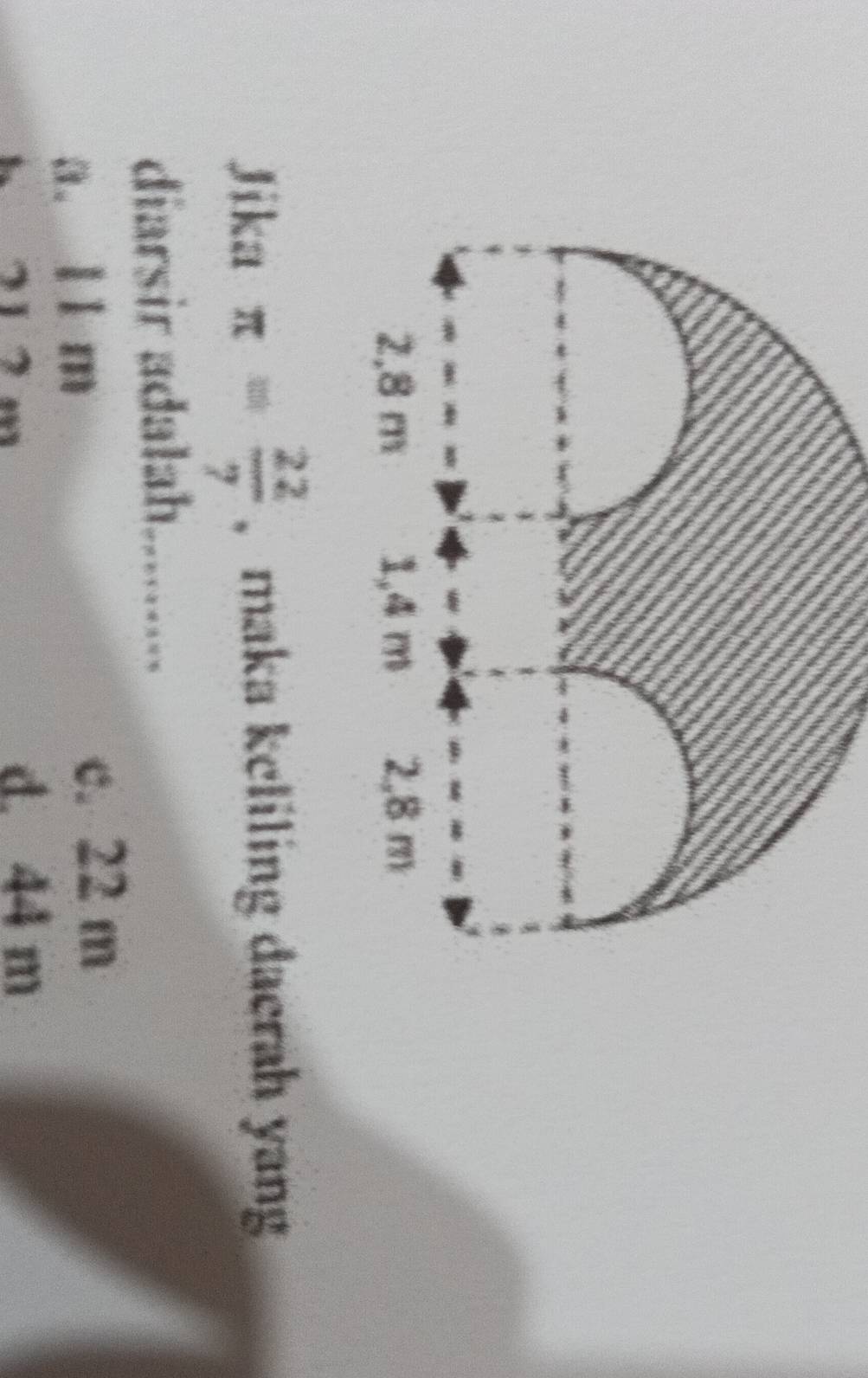 Jika π = 22/7  , maka keliling daerah yang
diarsir adalah. ......-.
a. 1 1 m
c. 22 m
h 71 2 m
d. 44 m