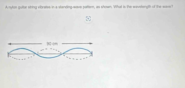 A nylon guitar string vibrates in a standing-wave pattern, as shown. What is the wavelength of the wave?
90 cm