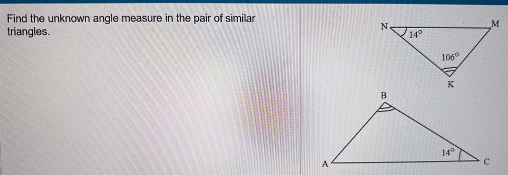 Find the unknown angle measure in the pair of similar
triangles.