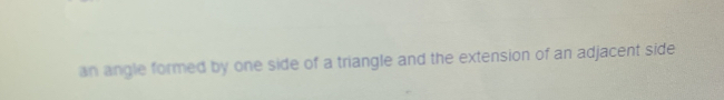 an angle formed by one side of a triangle and the extension of an adjacent side