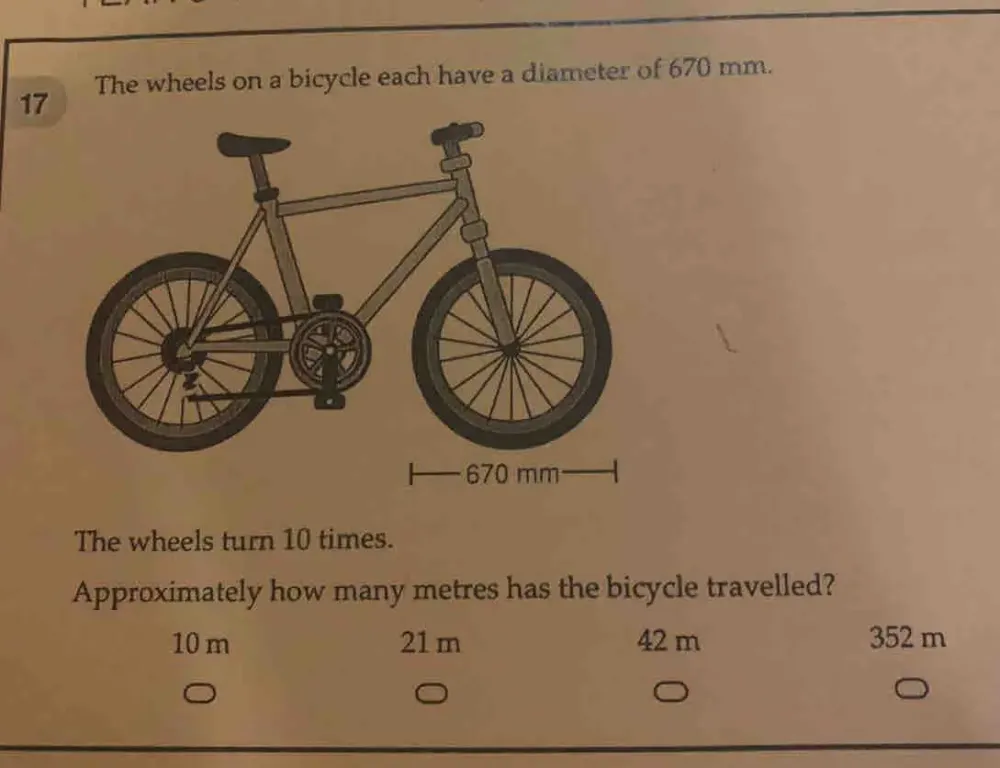 Solved: The wheels on a bicycle each have a diameter of 670 mm. The ...