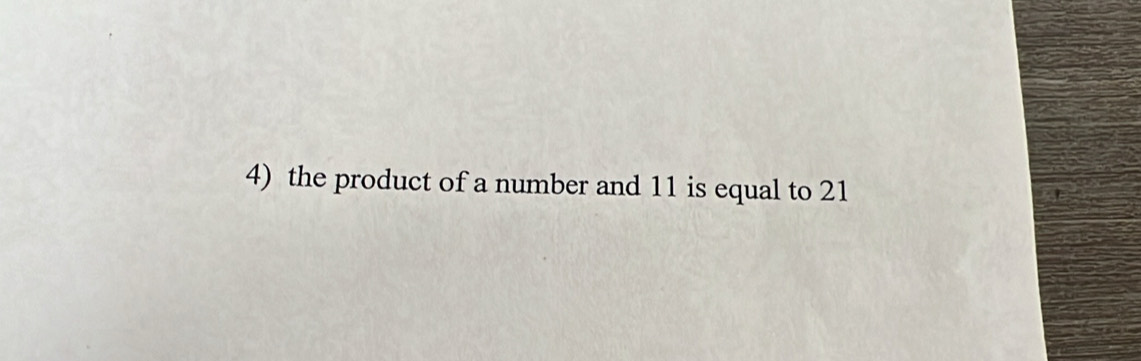 the product of a number and 11 is equal to 21