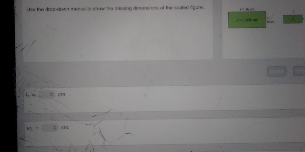 Use the drop-down menus to show the missing dimensions of the scaled figure.
CLEAR
l_1= cm
w_1=□ cm