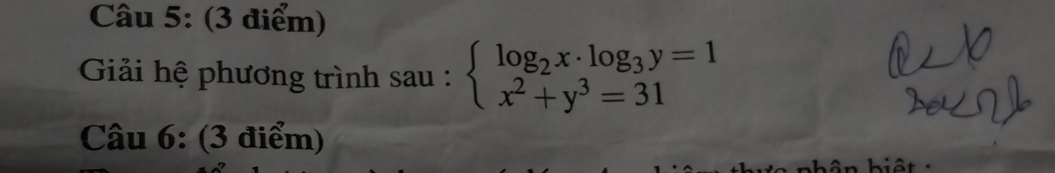 Giải hệ phương trình sau : beginarrayl log _2x· log _3y=1 x^2+y^3=31endarray.
Câu 6: (3 điểm)