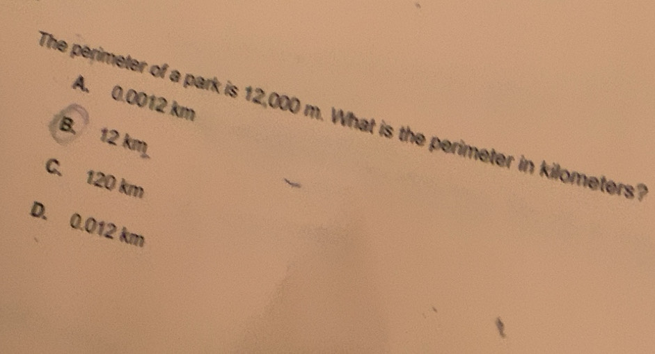 Solved: A. 0.0012 km The perimeter of a park is 12,000 m. What is the ...