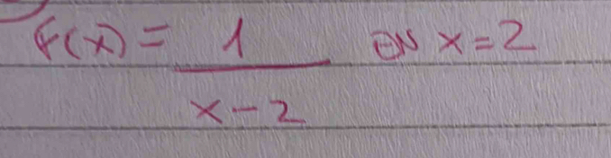 f(x)= 1/x-2  en x=2