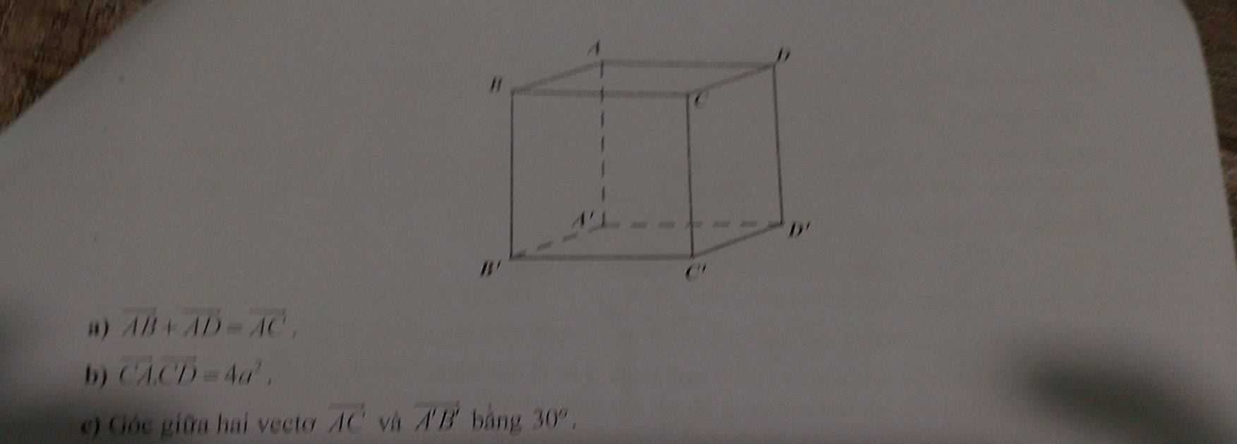 “) vector AB+vector AD=vector AC,
b) vector CA.vector CD=4a^2.
e) Góc giữa hai vecto vector AC và vector A'B' bǎng 30°,