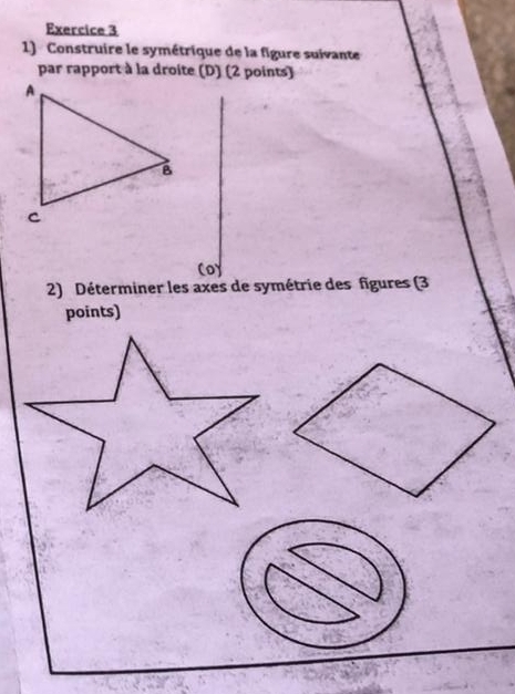 Construire le symétrique de la figure suivante 
par rapport à la droite (D) (2 points) 
CO 
2) Déterminer les axes de symétrie des figures (3 
points)