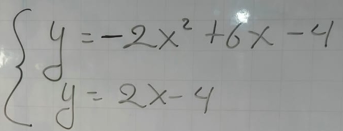 beginarrayl y=-2x^2+6x-4 y=2x-4endarray.