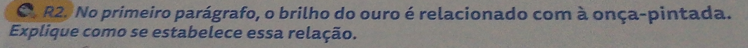 R2. No primeiro parágrafo, o brilho do ouro é relacionado com à onça-pintada. 
Explique como se estabelece essa relação.