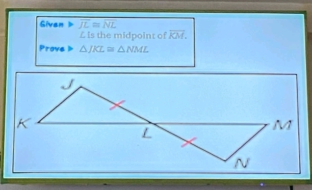 Given overline JL≌ overline NL
L is the midpoint of overline KM. 
Prove △ JKL≌ △ NML