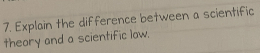 Explain the difference between a scientific 
theory and a scientific law.