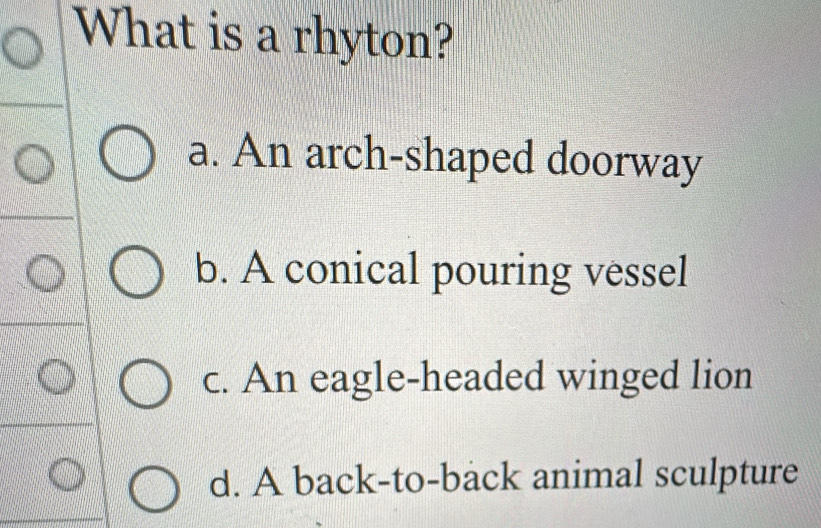 Solved: What is a rhyton? a. An arch-shaped doorway b. A conical ...