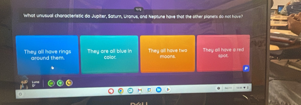 What unusual characteristic do Jupiter, Saturn, Uranus, and Neptune have that the other planets do not have?
They all have rings They are all blue in They all have two They all have a red
around them. color. moons. spot.
c 1