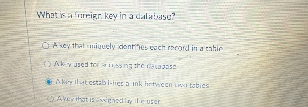 Solved: What is a foreign key in a database? A key that uniquely ...