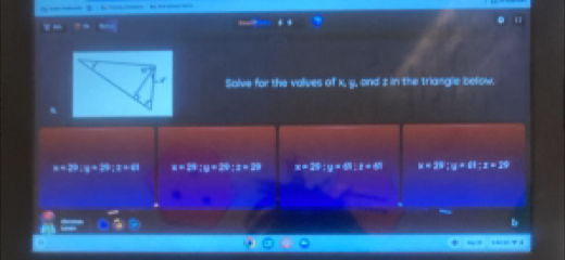Solve for the volves of x, y, ond z in the triangle below.
x=29 :x+24:x=81 x=24; y=24; z=29 x=29:y=41:1=41 x=39;y=61; z=29
b