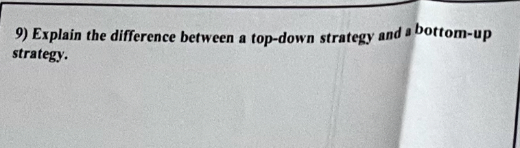 Explain the difference between a top-down strategy and a bottom-up 
strategy.