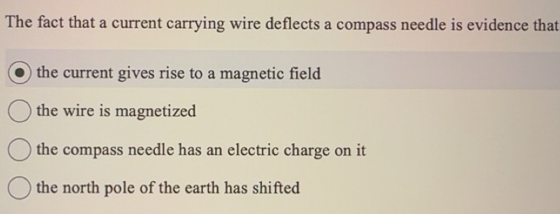 Solved: The fact that a current carrying wire deflects a compass needle ...