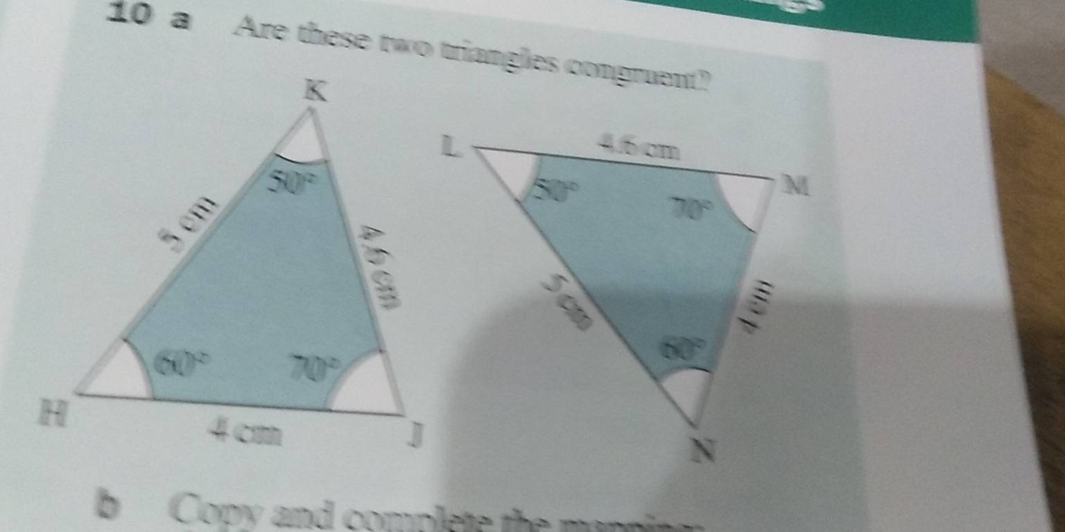 a Are these two triangles congruent?
b Copy and complete the mopping