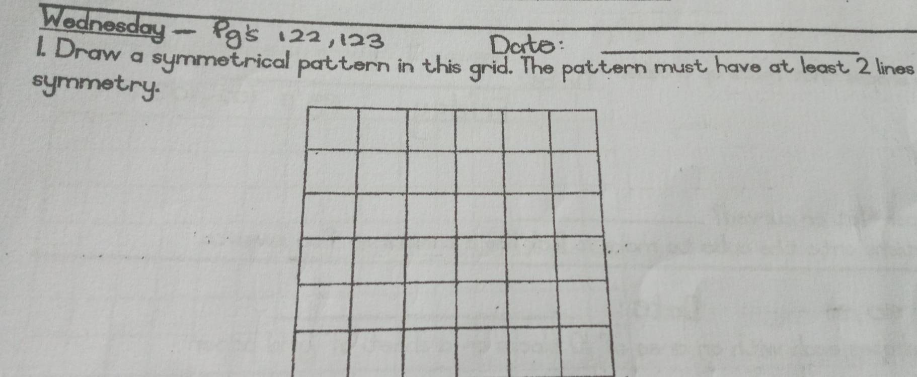 Solved: Wednesday 1. Draw a symmetrical pattern in this grid. The ...