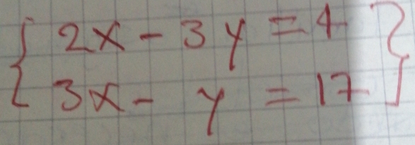 beginarrayl 2x-3y=4 3x-y=17endarray.