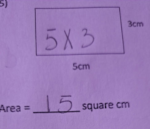 Área = _ square cm