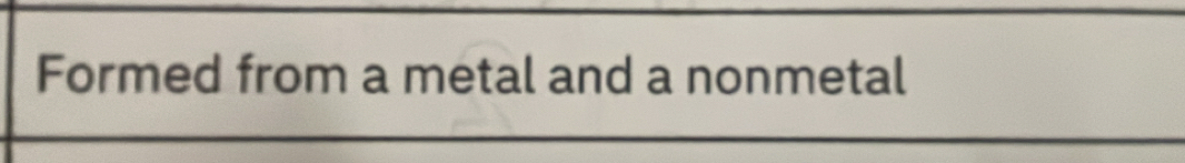 Formed from a metal and a nonmetal